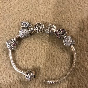 Pandora charm bracelet. 7 charms included